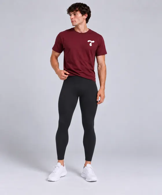 Black leggings with a burgundy t-shirt
